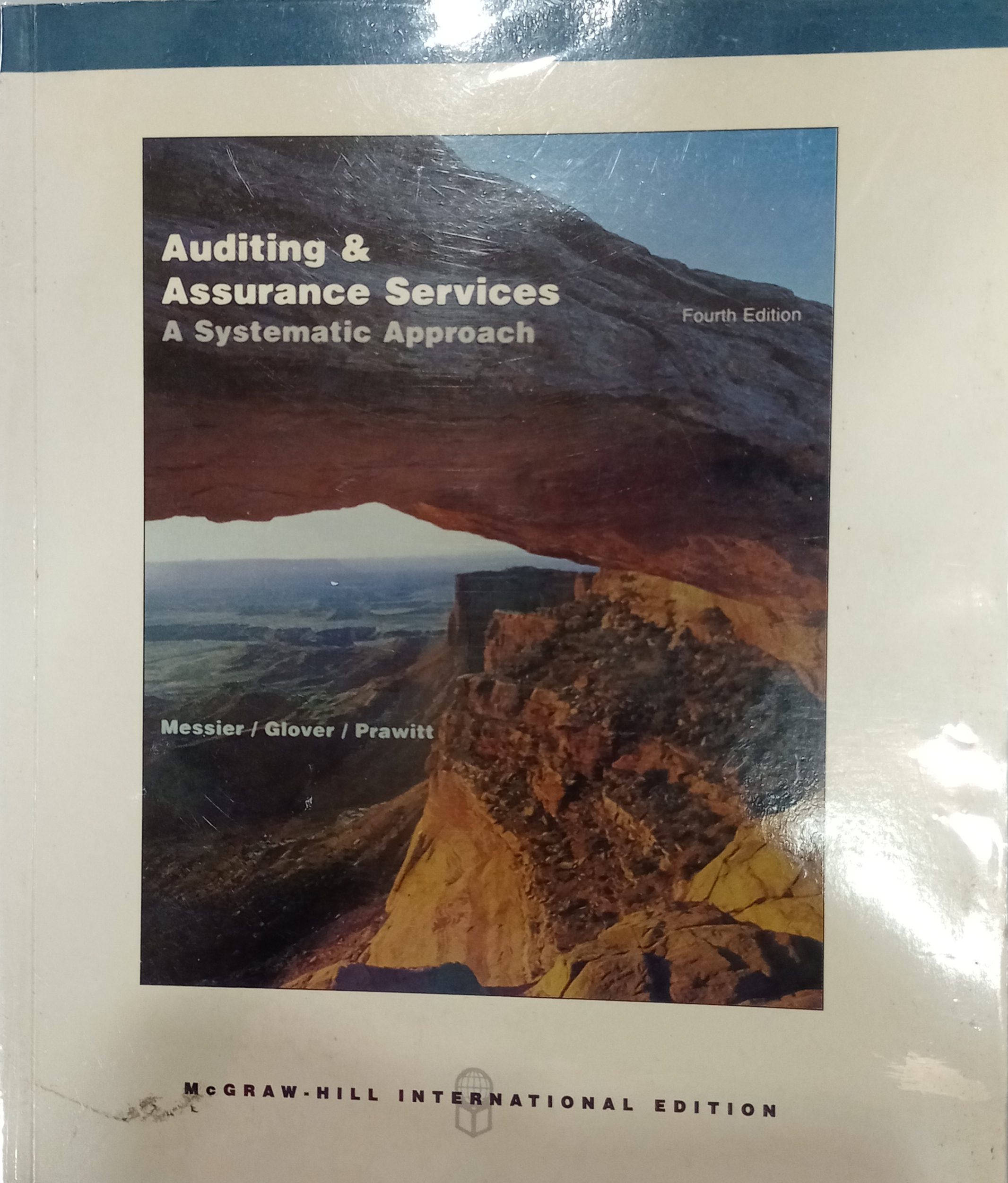 Book cover: Auditing & assurance services : a systematic approach