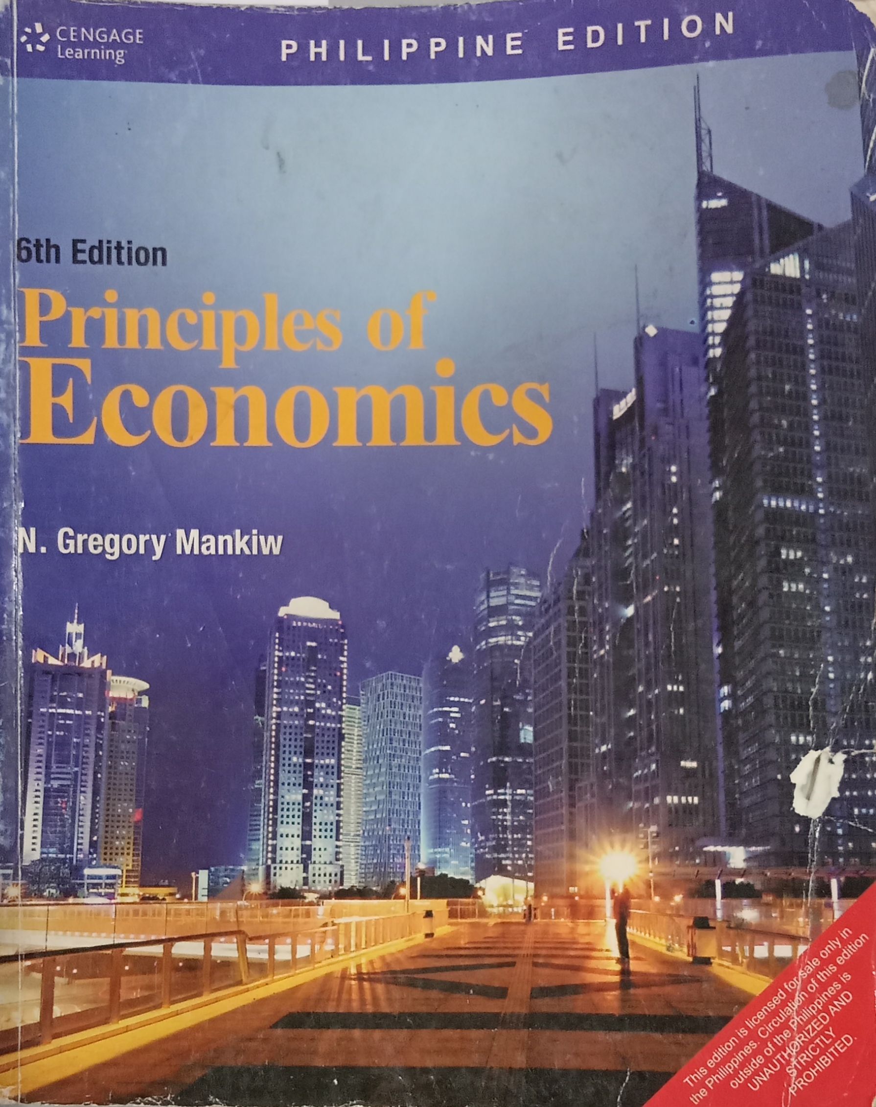 Book cover: Principles of economics