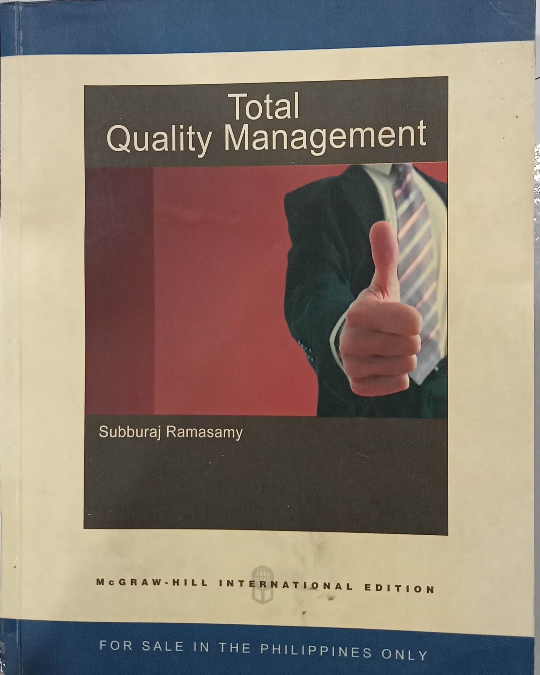 Book cover: Total quality management